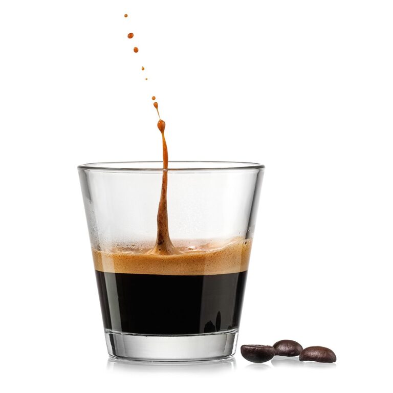Espresso,Coffee,Glass,With,A,Drop,Up,On,White,Background